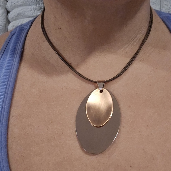 Jewelry - Copper Color Pendant On Leather String